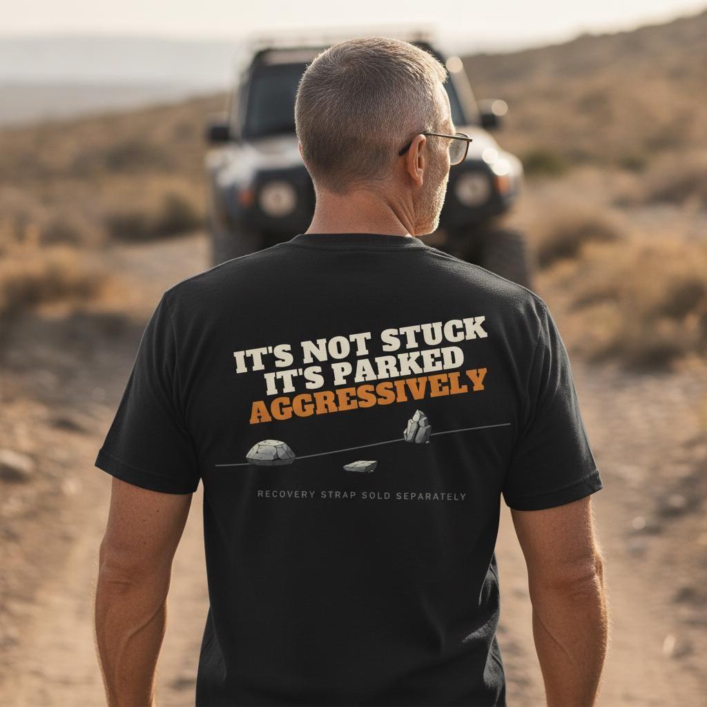 It's Not Stuck It's Parked Aggressively Shirt | Funny Off Road 4x4 Tee | Recovery Humor Overland Gift | Garment-Dyed Heavyweight